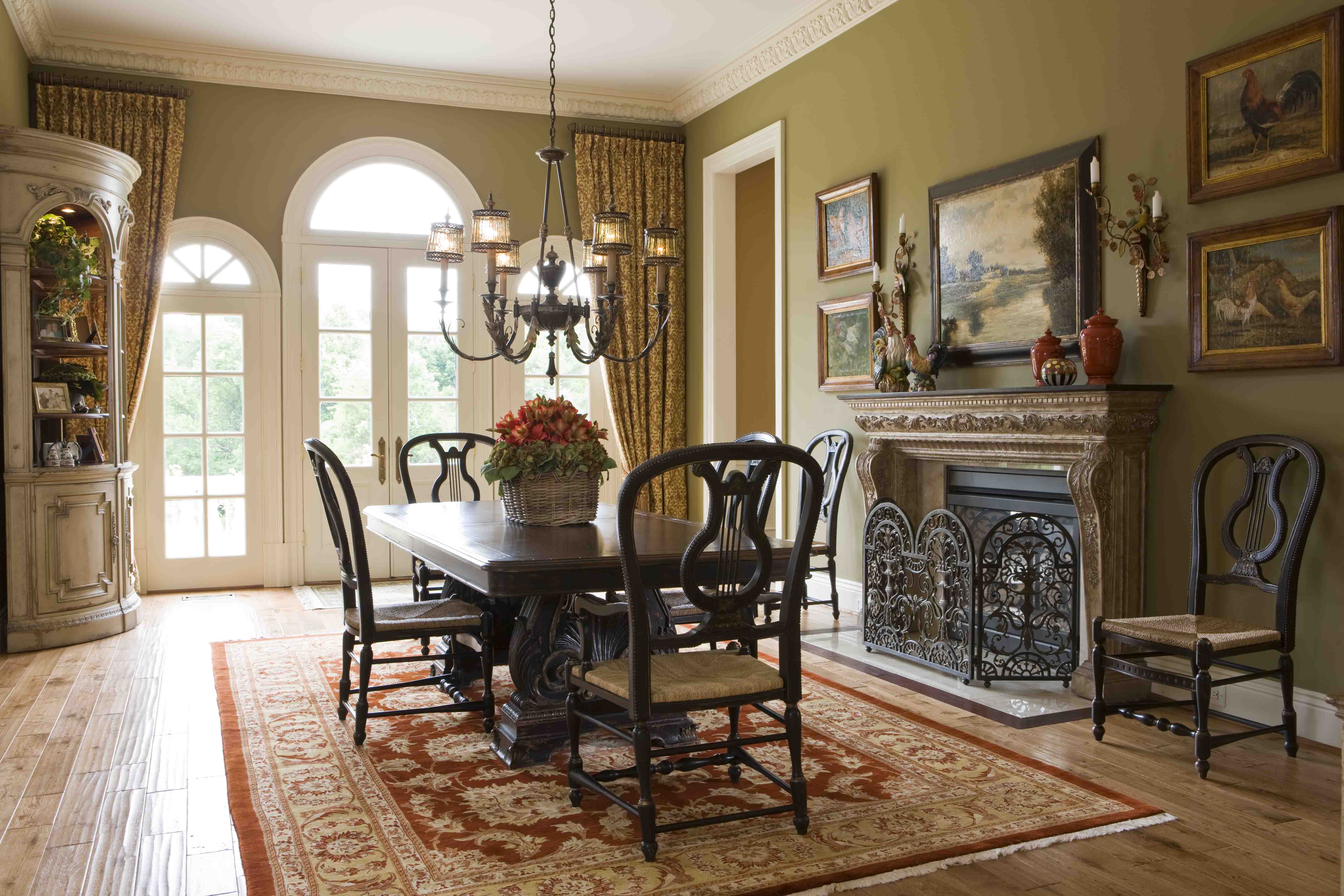 Custom dining room with fireplace with Persian rug in neutral colors