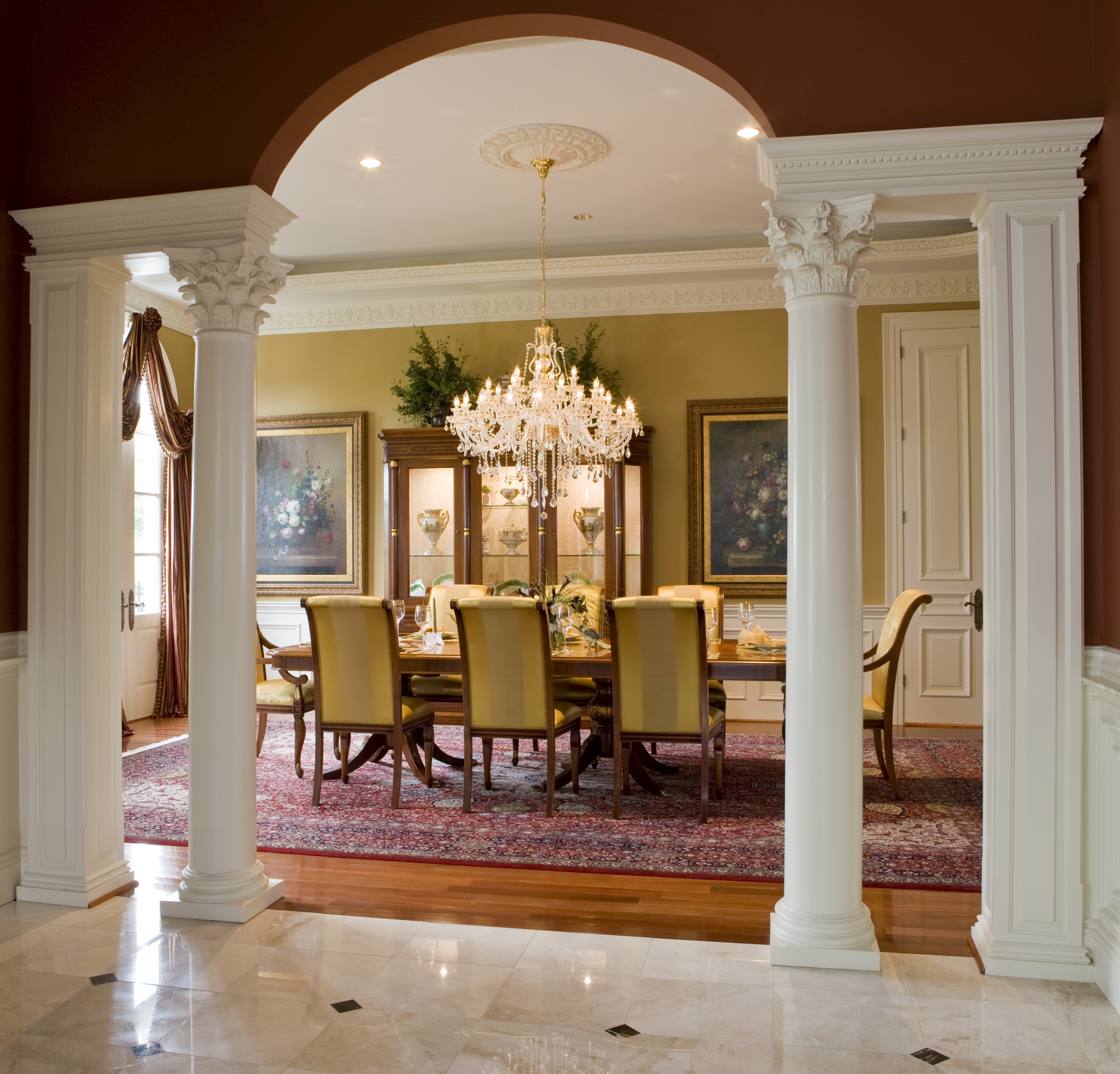 Formal Dining room with columns in mansion in Potomac, Maryland