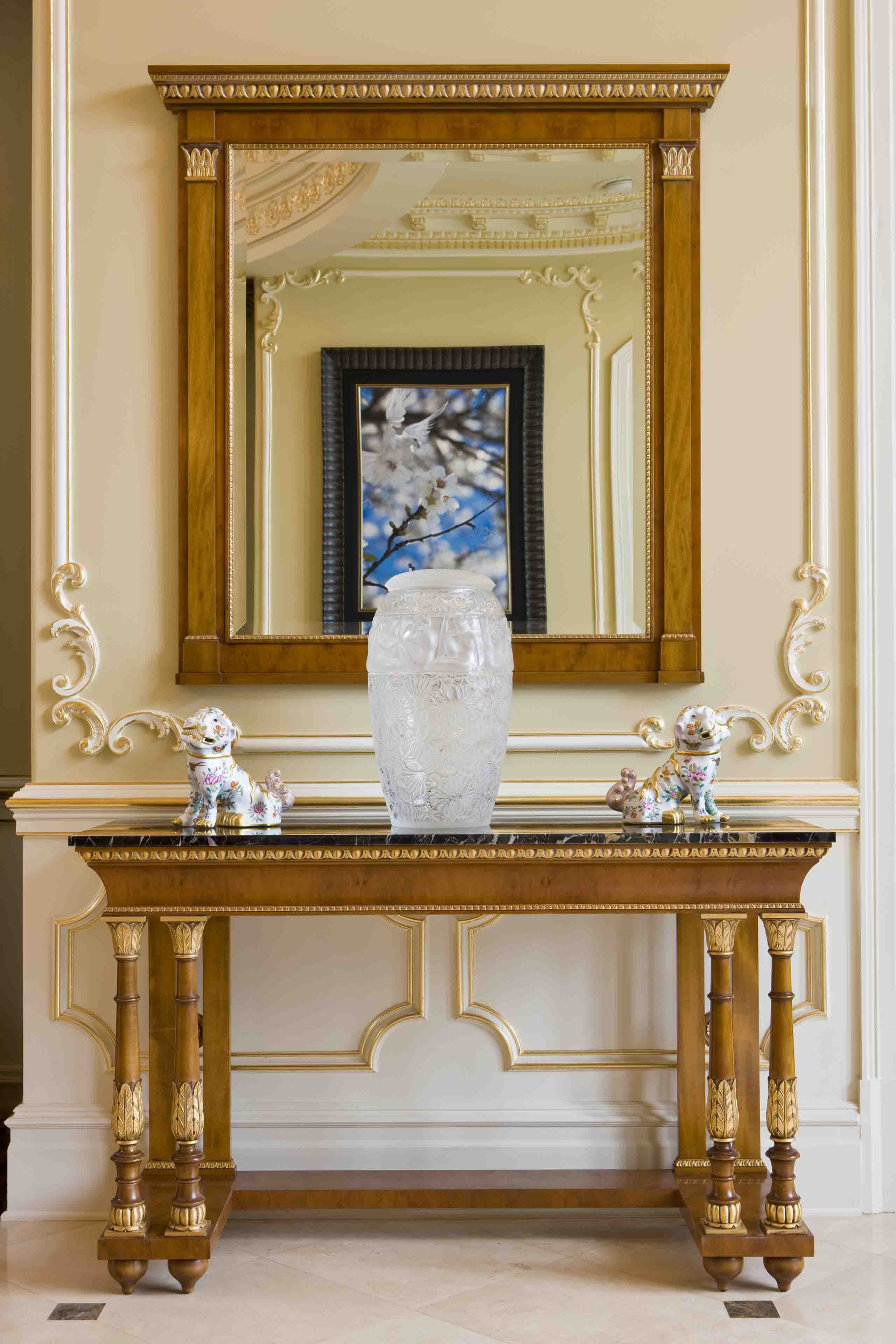 Classical table for foyer with crystal large Lalique vase and custom wall panels