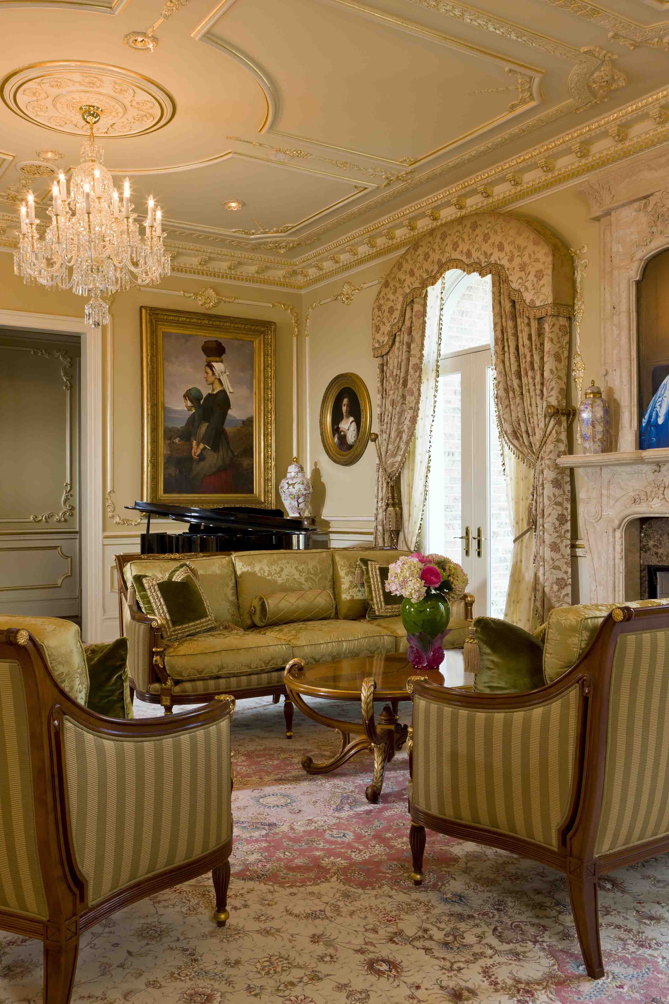 Classical grand salon with piano, fireplace and persian rug